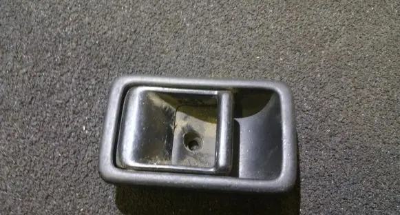 Mazda 323 Rear door interior handle