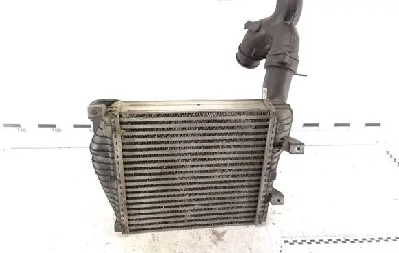 Volkswagen Touareg I Intercooler radiator 7L6145803C