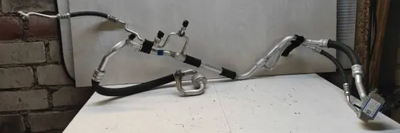 KIA Sportage Air conditioning (A/C) pipe/hose 97775F1280 121220