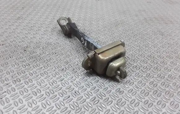 Nissan Primera Rear door check strap stopper