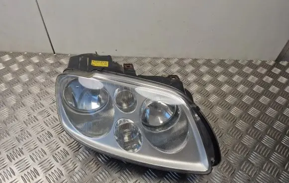 Volkswagen Touran I Headlight/headlamp 1T0941006M