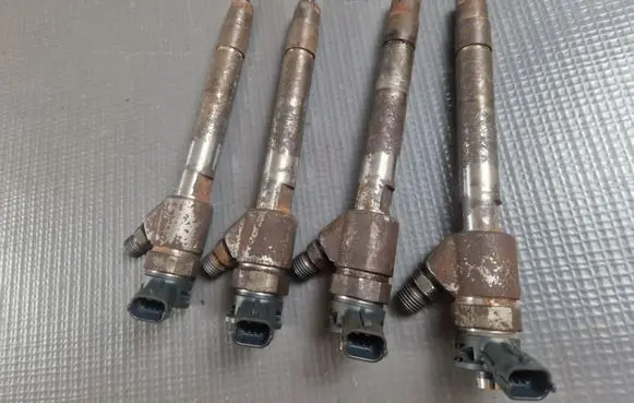 Peugeot Partner III Fuel injectors set 9828959880 0445110955