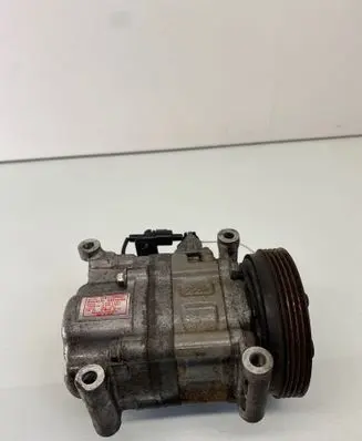 Suzuki Swift I Air conditioning (A/C) compressor (pump) 9520163JA1 D4109550 108A1AA4AG