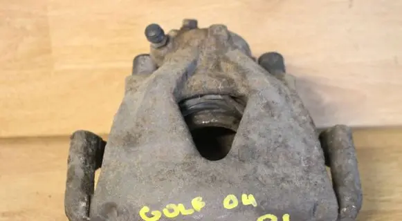 Volkswagen Golf IV Front brake caliper