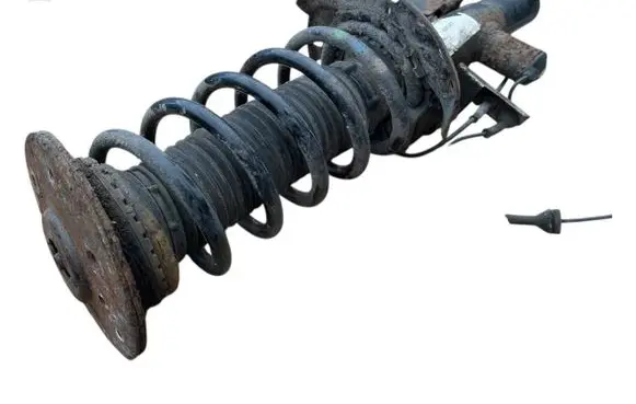Front shock absorber with coil spring