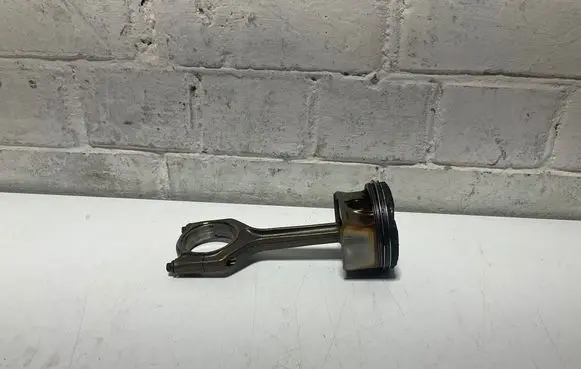 Piston with connecting rod