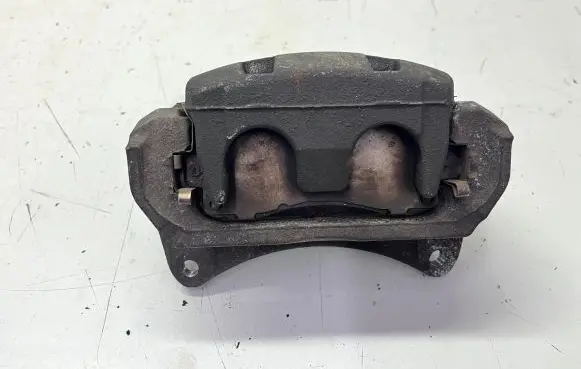 Subaru Outback (BT) Front brake caliper