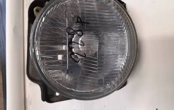Volkswagen Golf II Headlight/headlamp 111941605A