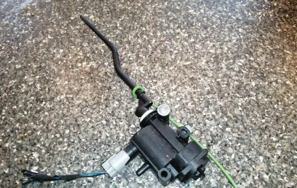 Fuel tank cap lock motor