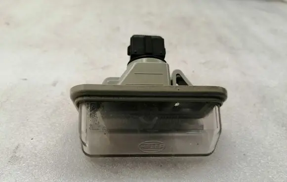 Toyota Avensis T250 Number plate light 8127005042