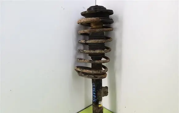 Citroen Berlingo Front shock absorber with coil spring 