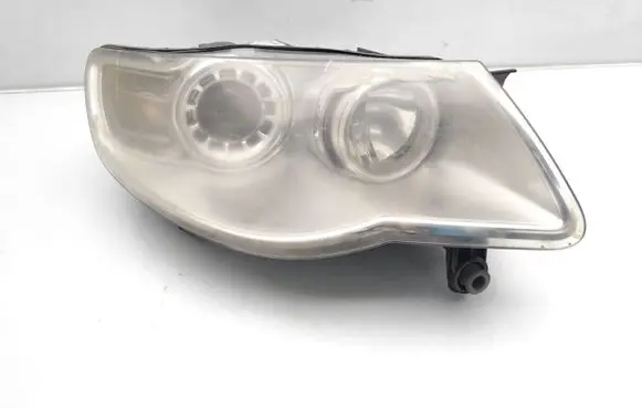 Volkswagen Touareg I Headlight/headlamp 7L6941032A 1LL247032-04
