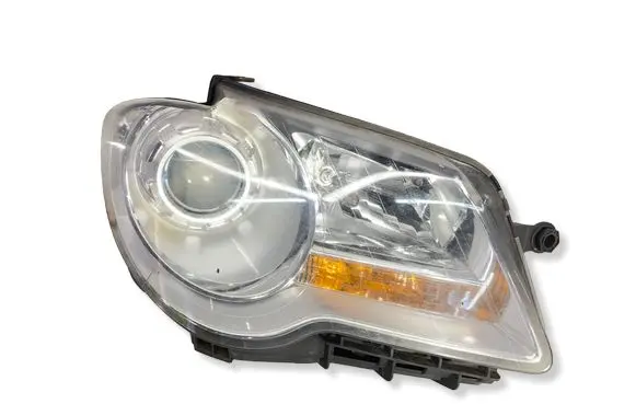 Volkswagen Touran I Headlight/headlamp 0301233602 1T2941006B RHD