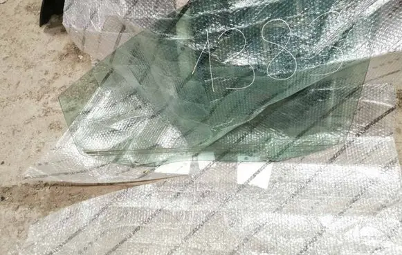 Dodge Grand Caravan Front door window/glass (coupe) 