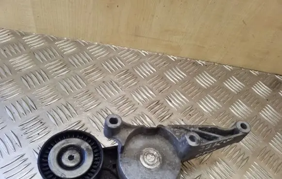 Generator/alternator belt tensioner
