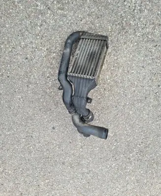 Opel Zafira A Intercooler radiator 24406701 57965