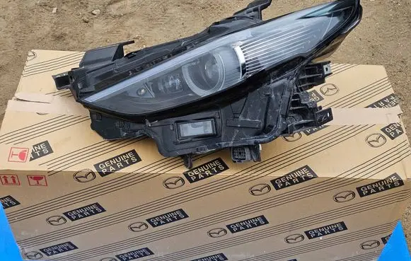 Mazda 3 Headlight/headlamp BGKN67890