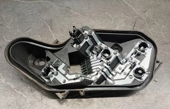 Opel Corsa D Tail light bulb cover holder