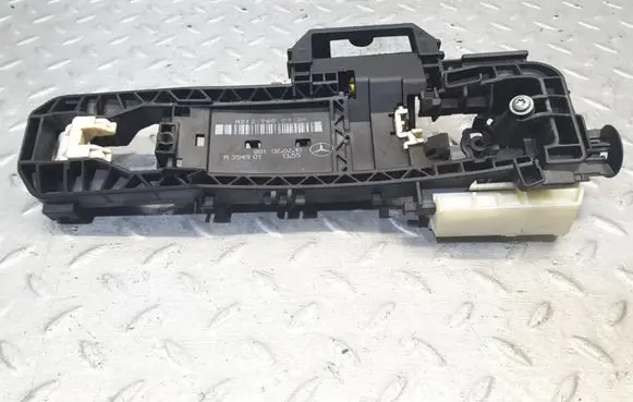 Rear door exterior handle/bracket