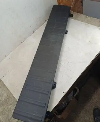 Trunk/boot lower side trim panel