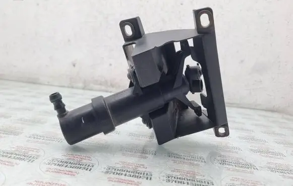 Volkswagen Touareg I Headlight washer spray nozzle 7L6955978