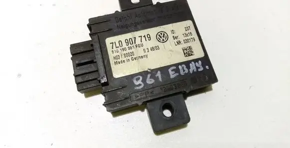 Volkswagen Touareg I Alarm control unit/module 7L0907719