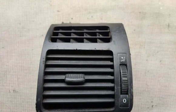 Volkswagen Touran I Dash center air vent grill 1T0819703A