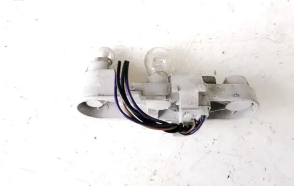 Tail light bulb cover holder