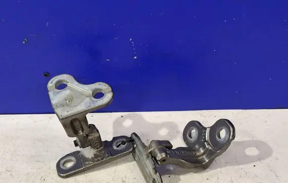 Rear door upper hinge