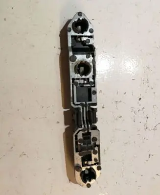 Tail light bulb cover holder
