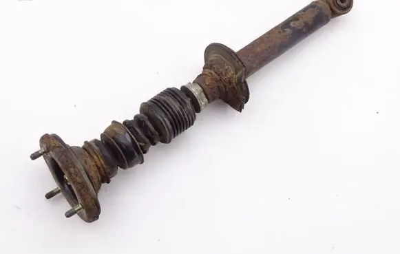 Mitsubishi Pajero Front shock absorber with coil spring MR554292