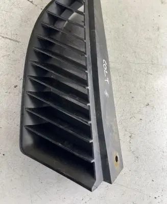 Mitsubishi Colt Front bumper upper radiator grill MN127774