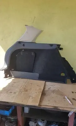 Trunk/boot side trim panel