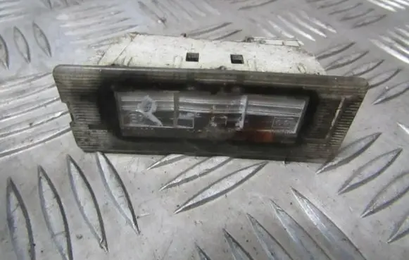 Renault Laguna II Number plate light 7700796162