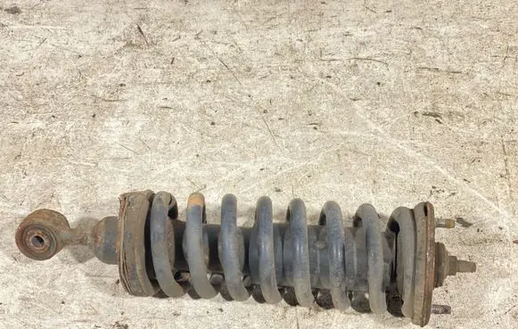 Nissan Navara D40 Front shock absorber with coil spring