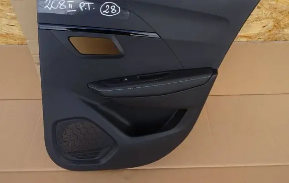 Peugeot 208 II Coupe rear side trim panel 