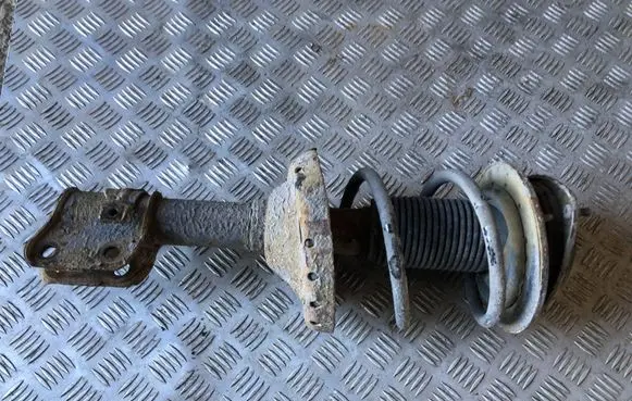 Subaru Legacy Front shock absorber with coil spring