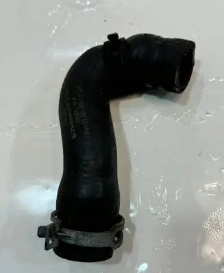 Volkswagen Golf VII Engine coolant pipe/hose 5Q0122157AM