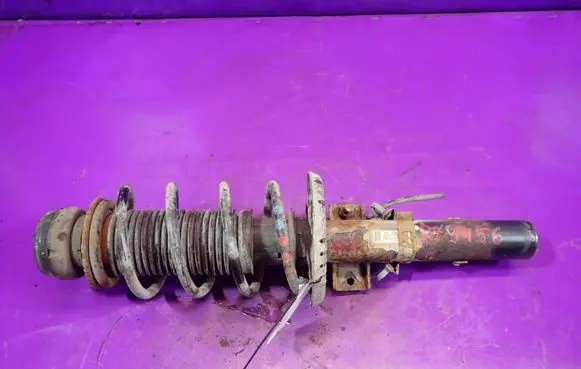 Skoda Fabia Mk2 (5J) Front shock absorber with coil spring 