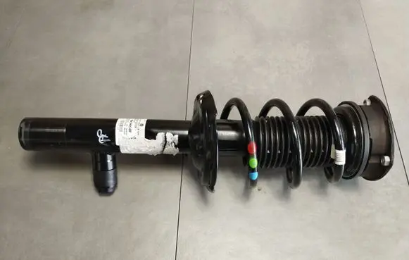 Cupra Formentor Front shock absorber with coil spring 5WA413032K