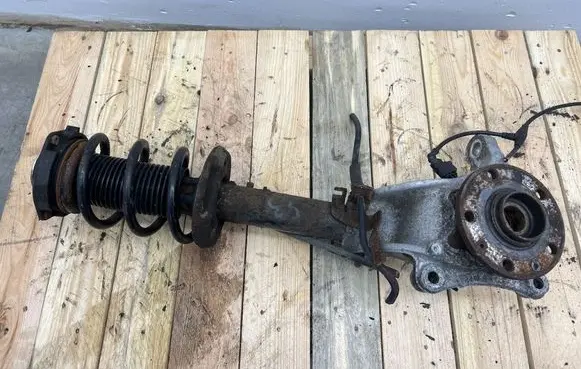 Audi A3 S3 A3 Sportback 8P Front shock absorber with coil spring 