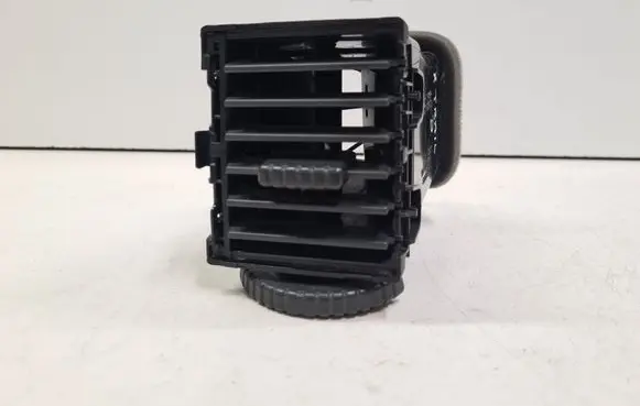 Nissan X-Trail T30 Dash center air vent grill 68750EQ000 E6475161