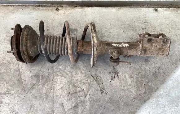 Toyota Corolla E120 E130 Front shock absorber with coil spring