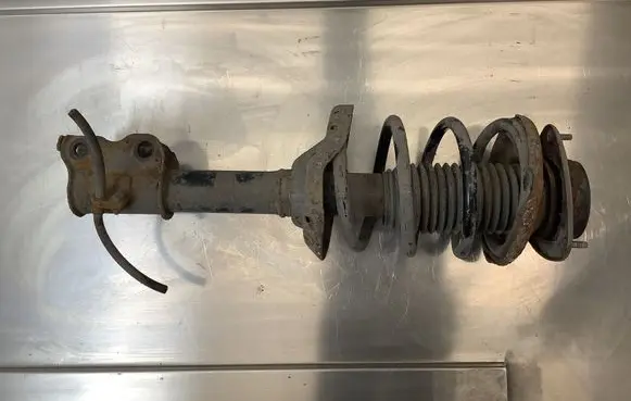 Subaru Tribeca Front shock absorber with coil spring 