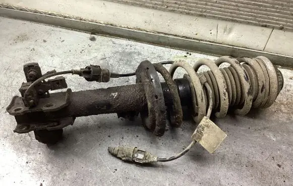 Front shock absorber with coil spring