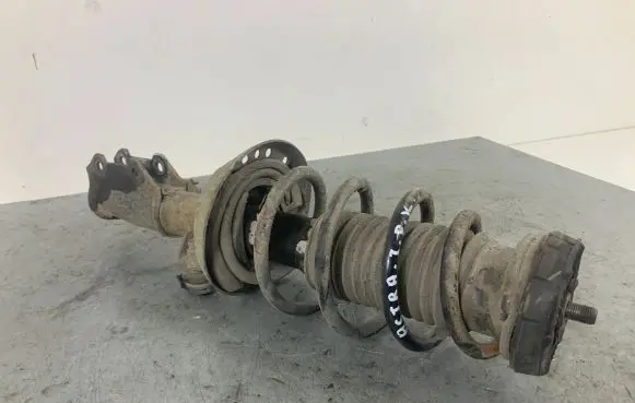 Opel Astra J Front shock absorber with coil spring 13412611