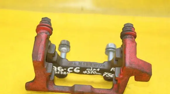 Audi A6 S6 C6 4F Brake caliper pad carrier rear 