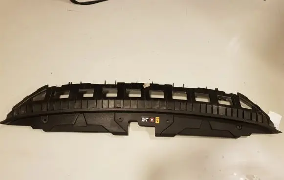 Engine bonnet/hood lock trim molding