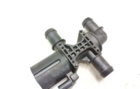 Coolant heater control valve
