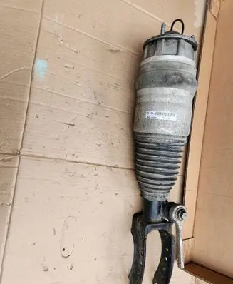 Volkswagen Touareg II Front air suspension shock absorber 7P6616039K